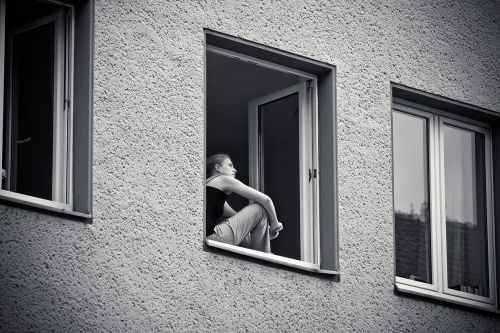 window woman building