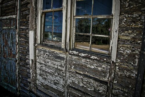 window tattered peeling