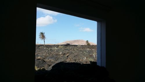 window volcano landscape