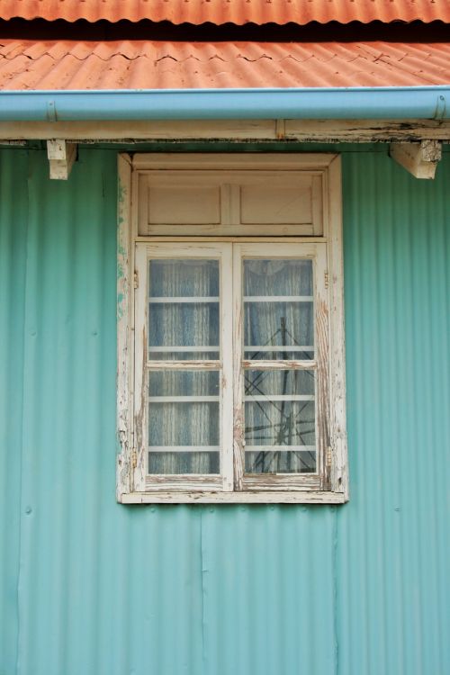 Window Under Red Roof