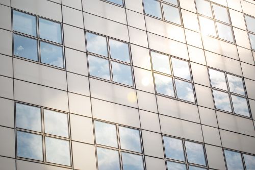 windows reflection clouds