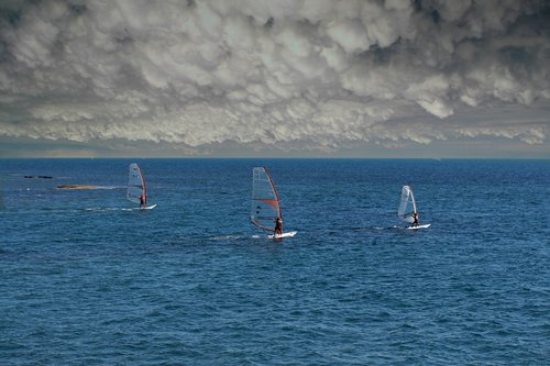 windsurfing  ocean  sky