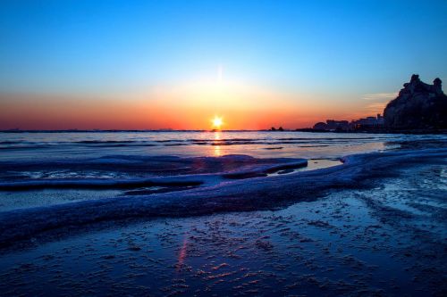 winter beach sunrise