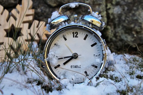 winter  time pointing  clock