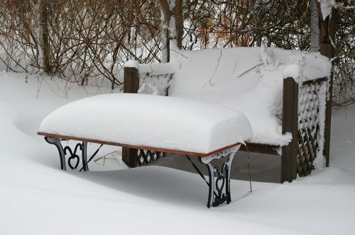 winter garden bench snowed in