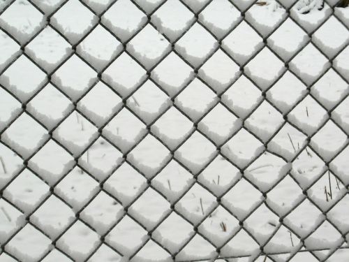 wire mesh fence winter snow