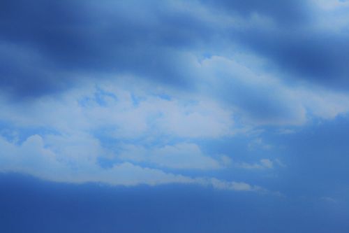 Wispy Clouds In Blue Sky