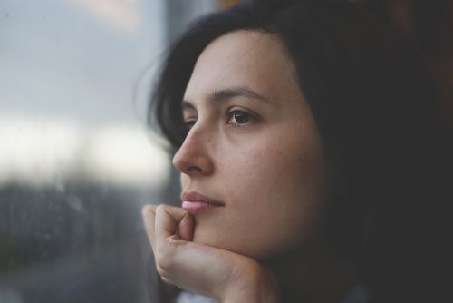 woman thoughtful pensive