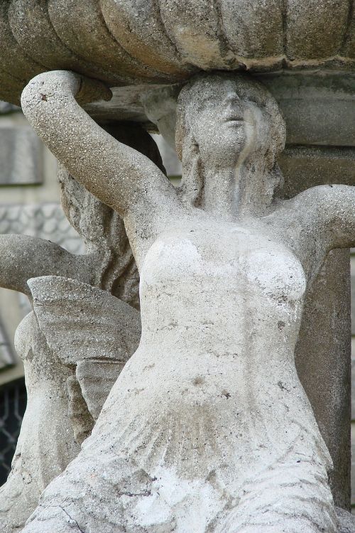 woman mermaid fountain