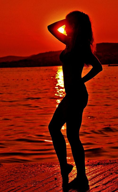 woman silhouette sunset