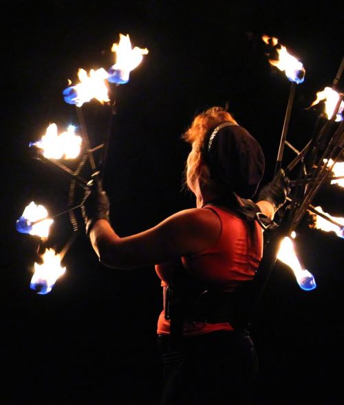 woman artist fire show