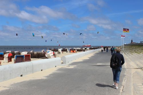 woman beach sky