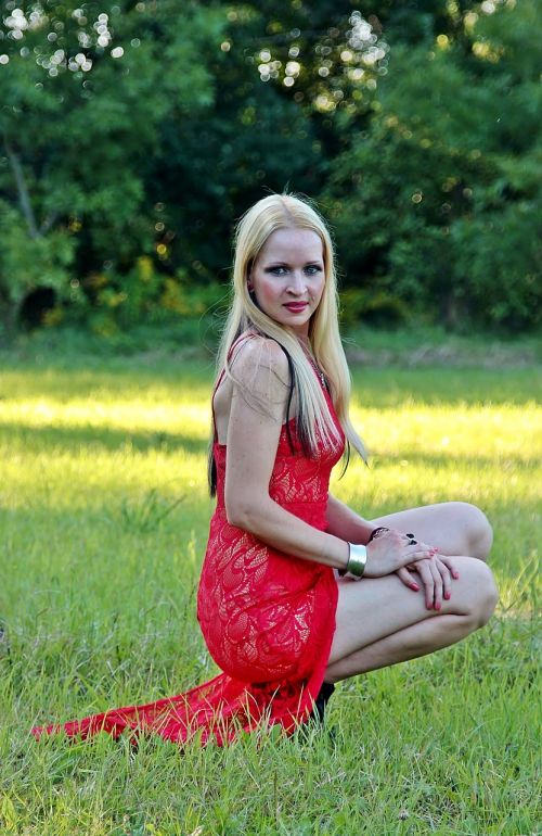 woman blonde red dress