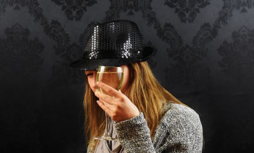 woman hat champagne