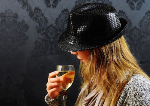 woman hat champagne