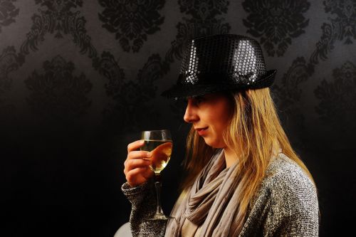 woman hat champagne