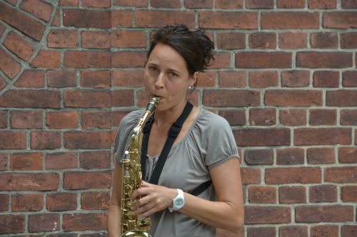 woman saxophone summer