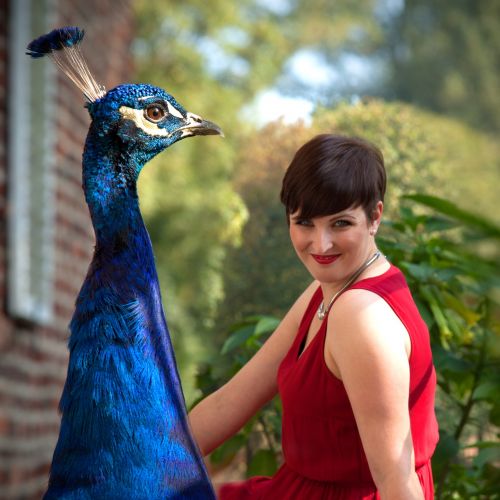 woman peacock bird