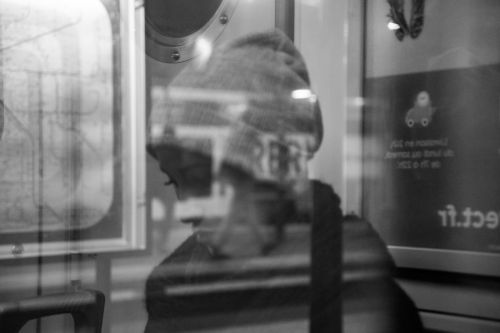 woman reflection metro