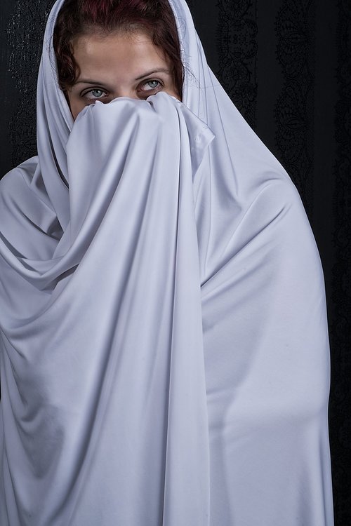 woman  eyes  white shroud
