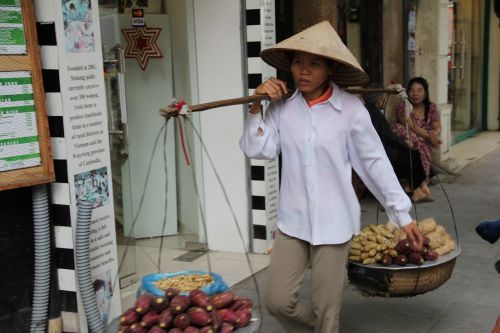 woman wear baskets street scene