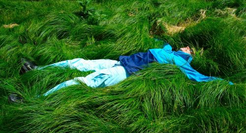 woman lying grass