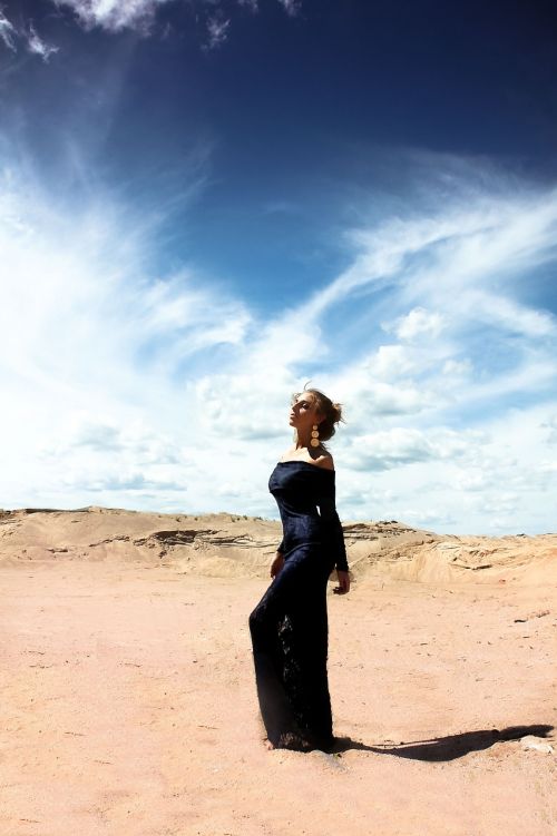 woman sky desert