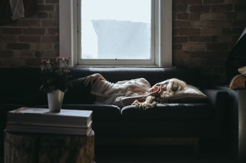 woman sleeping sofa