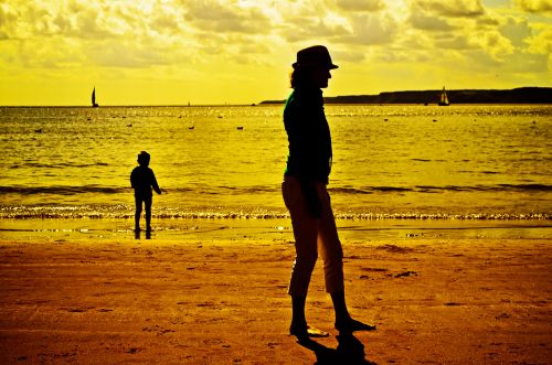 Woman, Child And Sea