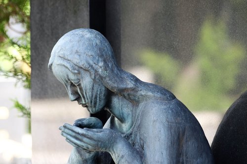 woman sculpture  sad  tears