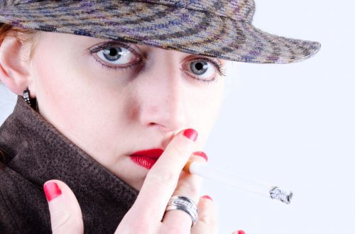 Woman Smokes A Cigarette