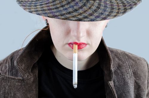 Woman Smokes A Cigarette