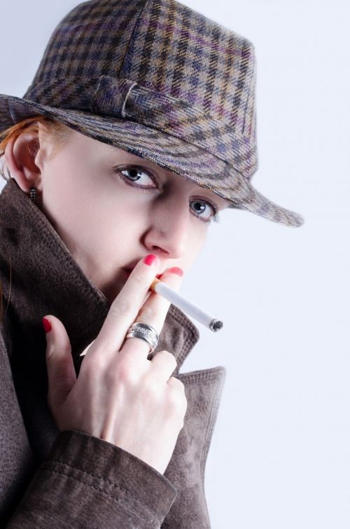 Woman Smokes A Cigarette