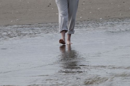 Woman Wading Through Water