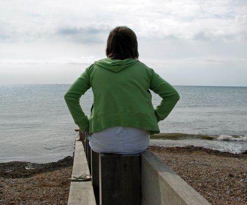 Woman Watching The Ocean
