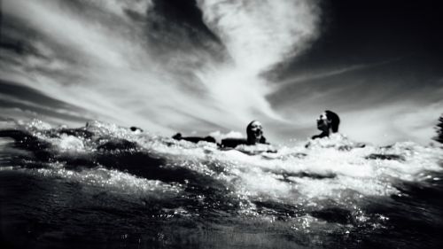 women swimming ocean