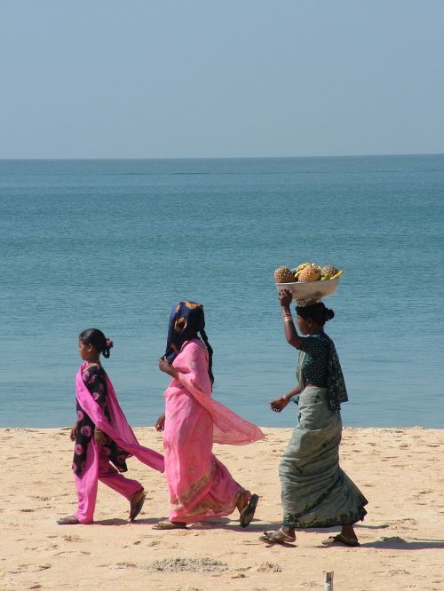 women beach water