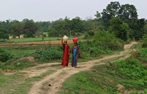 women village fetching water