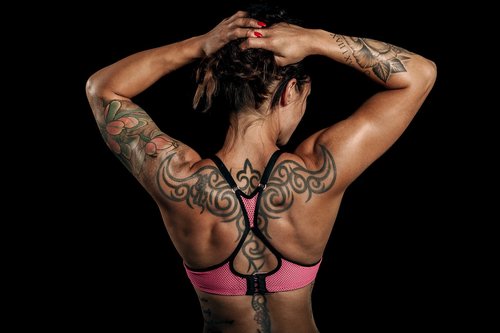 women  training  tattoo