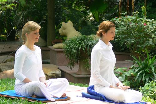 women meditation spa