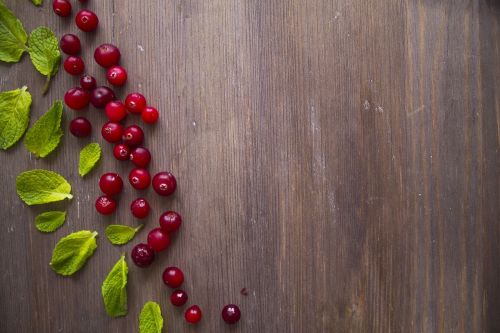 wood background cranberries