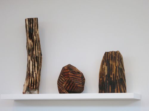 wood sculpture shelf