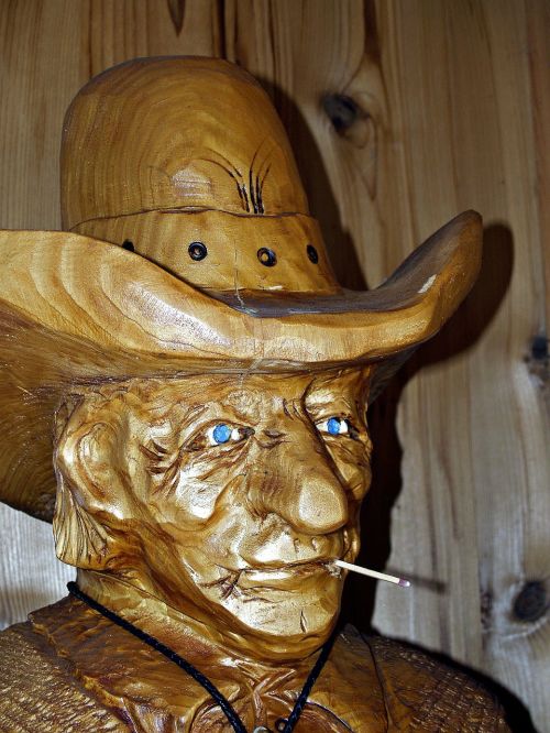 wood carving cowboy face