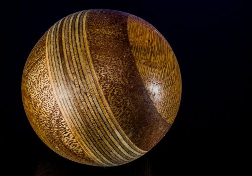 wooden ball turned hand labor