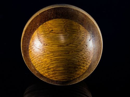 wooden ball turned hand labor