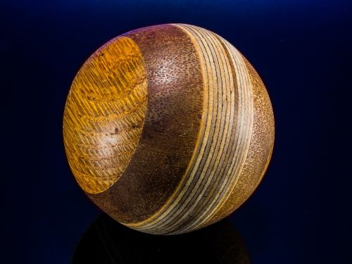 wooden ball turned hand labor