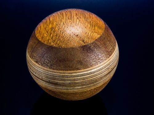 wooden ball turned hand labor