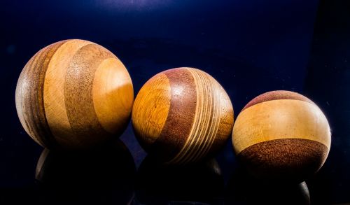 wooden ball turned hand labor