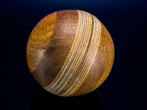 wooden ball turned hand labor