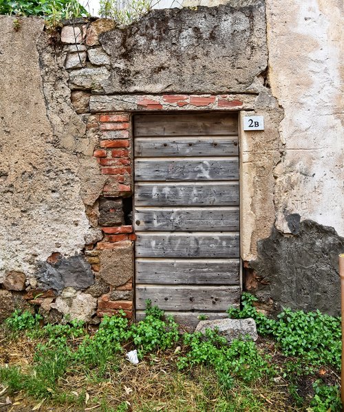 wooden door  stone wall  entrance